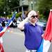 The Ypsilanti High School Marching Band stands in salute during the Memorial Day Parade on Monday, May 27. Daniel Brenner I AnnArbor.com